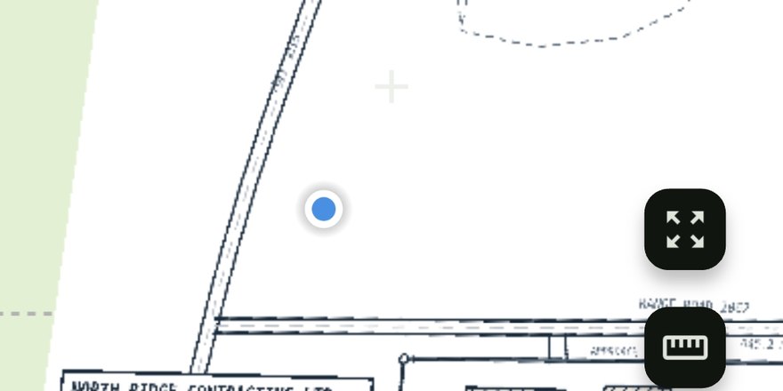 The same site plan georeferenced in MapPak, overlaid on the topo basemap with a live GPS dot